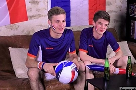 Two twinks support the French Soccer team in their own way