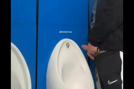 Risky urinal cum in busy public bathroom